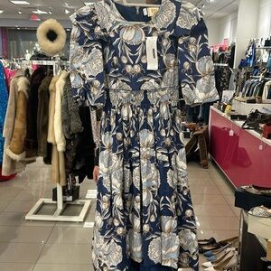 Emily McCarthy Xs
Blue dress